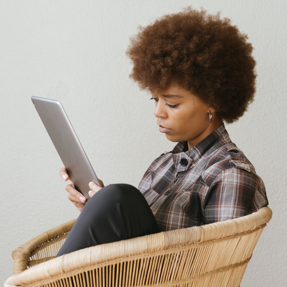 Woman on Tablet | Lisa McQueen | Lira Uganda | Image